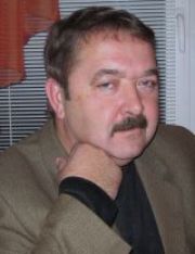николай